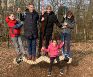Dixon family having fun on a giant swing